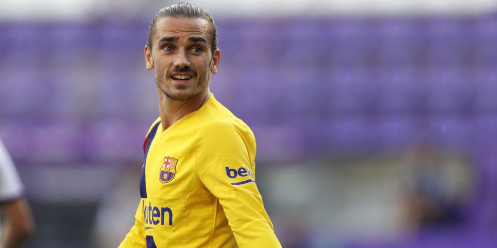 Griezman dengan seragam kuning lengan panjang Barcelona